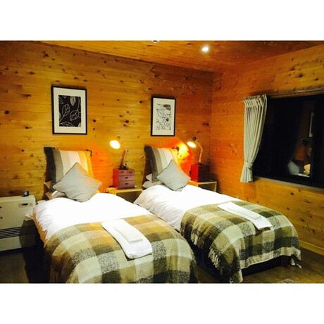 Imagen de la habitación del Hotel Hinoki Cabin Hakuba. Foto 22