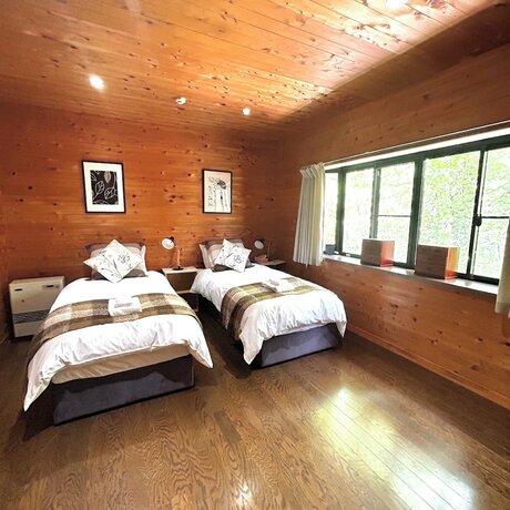 Imagen de la habitación del Hotel Hinoki Cabin Hakuba. Foto 23