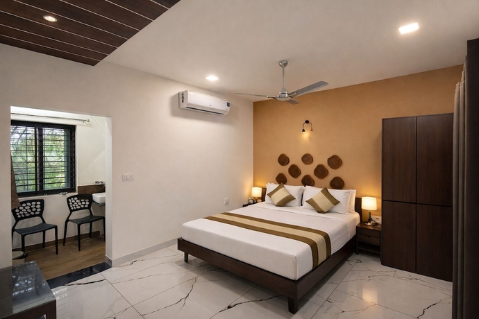 Imagen de la habitación del Hotel Hiran Gir Retreat Sasan Gir. Foto 11
