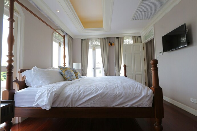 Imagen de la habitación del Hotel Hiranyakul House. Foto 15