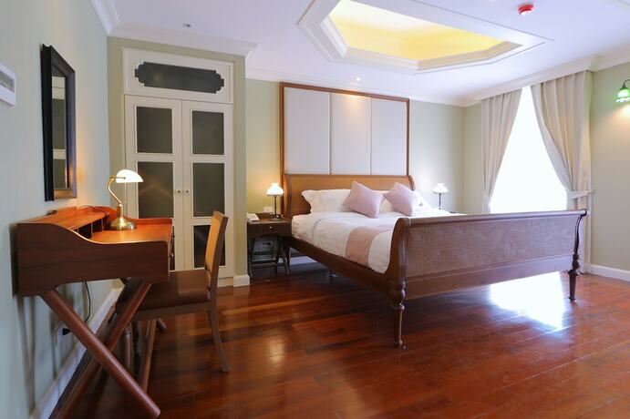 Imagen de la habitación del Hotel Hiranyakul House. Foto 19