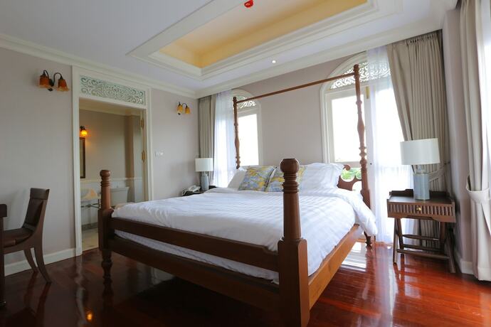 Imagen de la habitación del Hotel Hiranyakul House. Foto 22