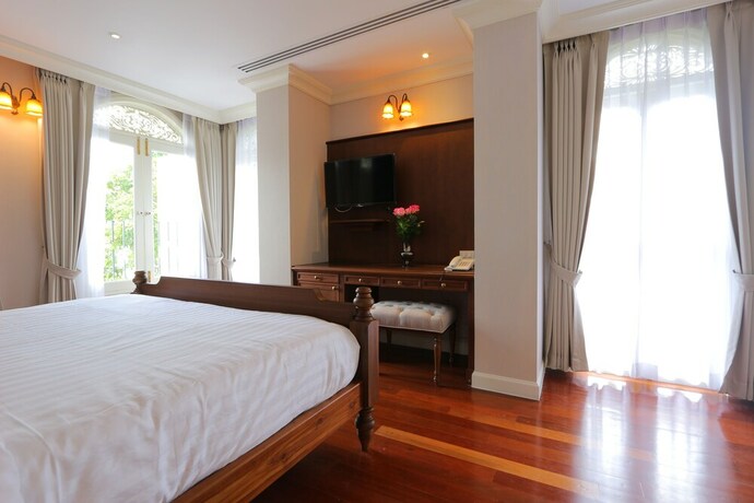 Imagen de la habitación del Hotel Hiranyakul House. Foto 26