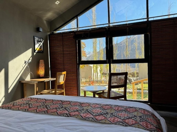 Imagen de la habitación del Hotel Hiraya Resort Hunza. Foto 8