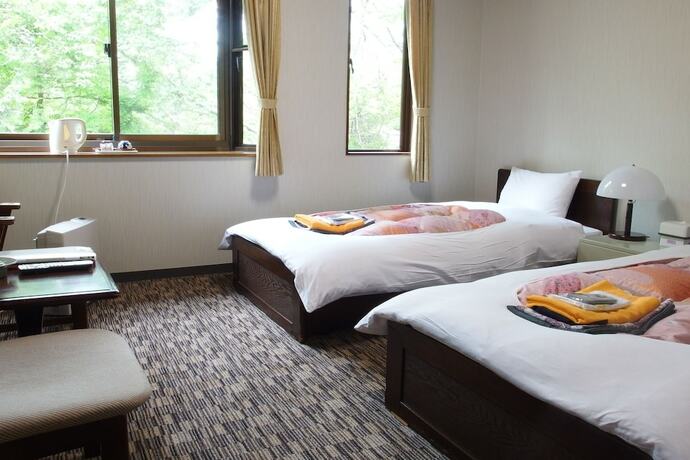 Imagen de la habitación del Hotel Hirayunomori. Foto 16