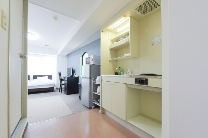 Imagen de la habitación del Hotel Hiroki Building. Foto 13