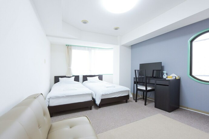 Imagen de la habitación del Hotel Hiroki Building. Foto 14