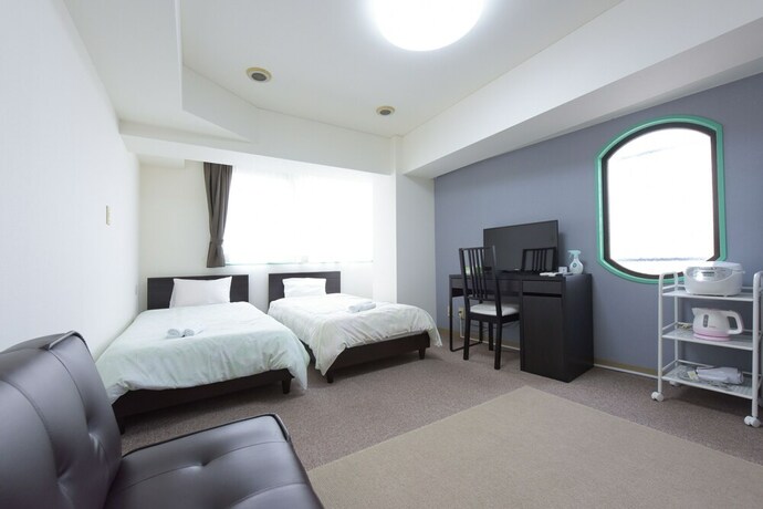 Imagen de la habitación del Hotel Hiroki Building. Foto 21