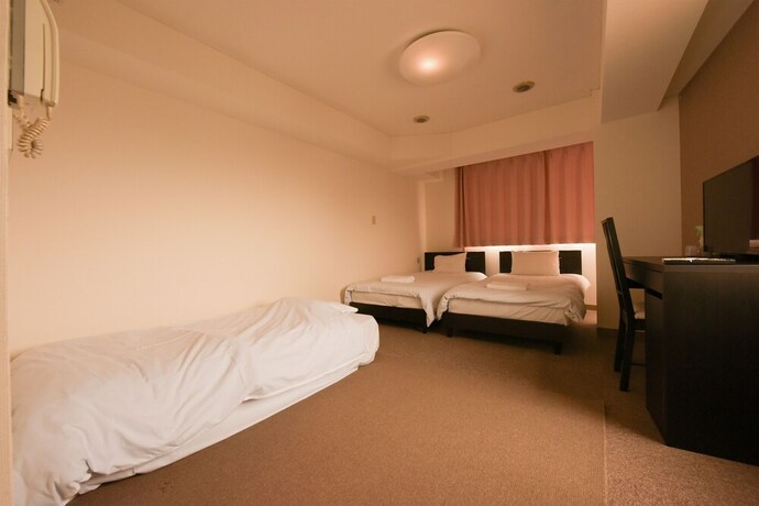 Imagen de la habitación del Hotel Hiroki Building. Foto 22