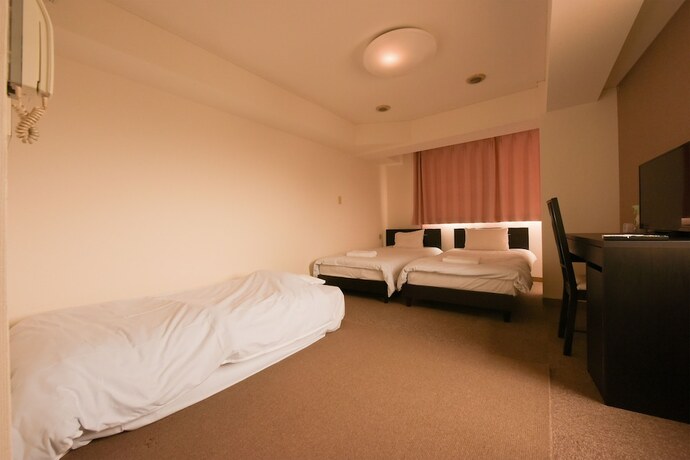 Imagen de la habitación del Hotel Hiroki Building. Foto 24