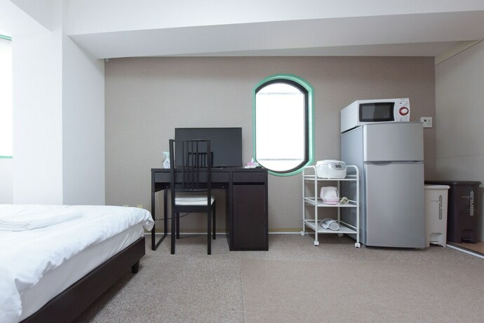 Imagen de la habitación del Hotel Hiroki Building. Foto 26