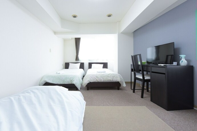 Imagen de la habitación del Hotel Hiroki Building. Foto 30