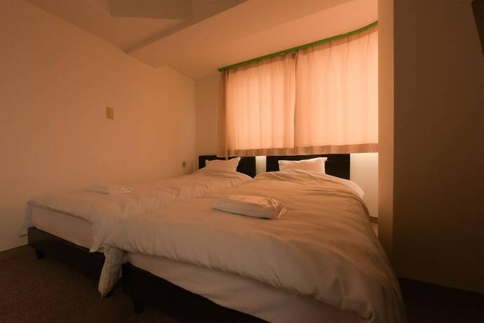 Imagen de la habitación del Hotel Hiroki Building. Foto 31