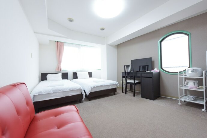 Imagen de la habitación del Hotel Hiroki Building. Foto 34