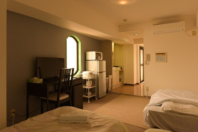 Imagen de la habitación del Hotel Hiroki Building. Foto 35