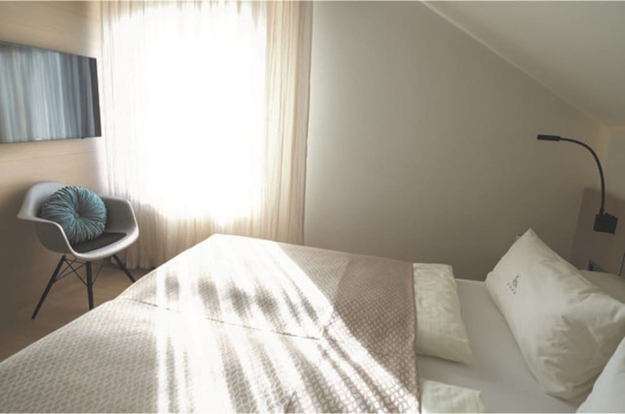 Imagen de la habitación del Hotel Hirschen Dornbirn Boutiquestyle. Foto 12
