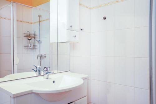 Imagen de la habitación del Hotel Hirschenhof Apartments. Foto 14