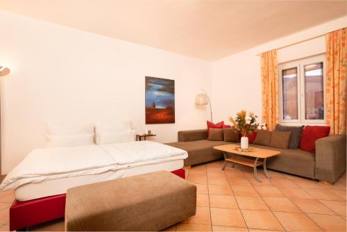 Imagen de la habitación del Hotel Hirschenhof Apartments. Foto 15