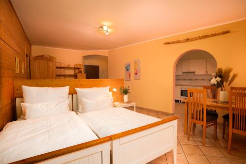 Imagen de la habitación del Hotel Hirschenhof Apartments. Foto 17