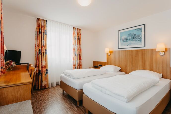 Imagen de la habitación del Hotel Hirschenwirt. Foto 15