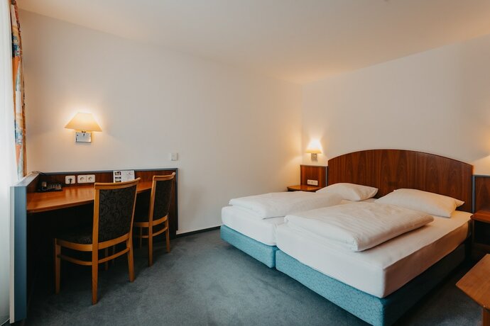 Imagen de la habitación del Hotel Hirschenwirt. Foto 16