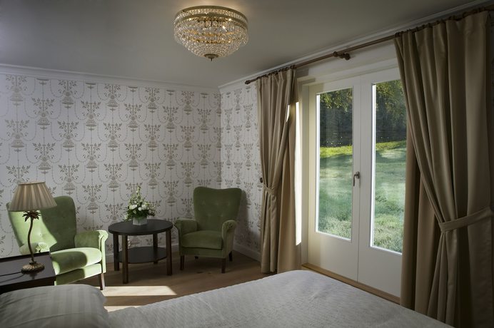 Imagen de la habitación del Hotel Hirvihaaran Kartano. Foto 8