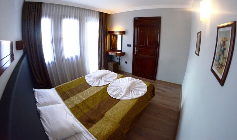 Imagen de la habitación del Hotel Hisar Holiday Club. Foto 12