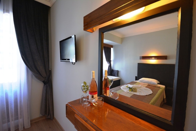 Imagen de la habitación del Hotel Hisar Holiday Club. Foto 14