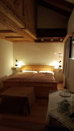 Imagen de la habitación del Hotel Historic La Stua. Foto 7