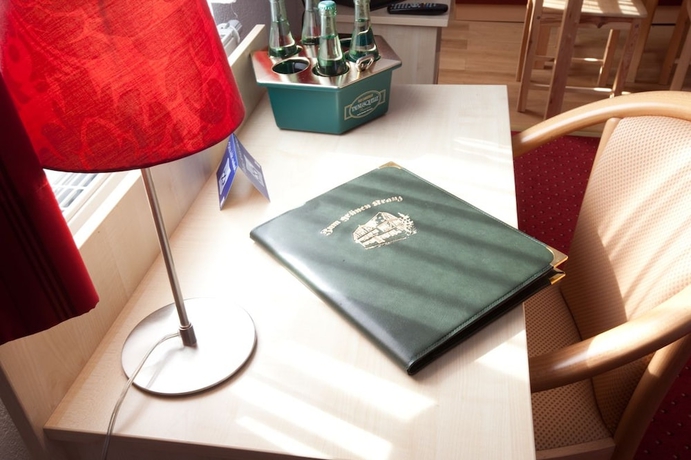 Imagen de la habitación del Hotel Historisches Weinrestaurant Zum Gr&uuml;nen Kranz. Foto 19