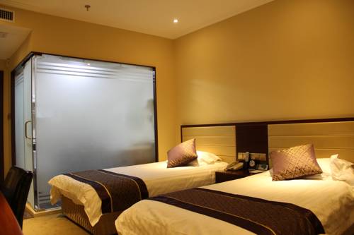 Imagen de la habitación del Hotel Hit Business Harbin. Foto 4