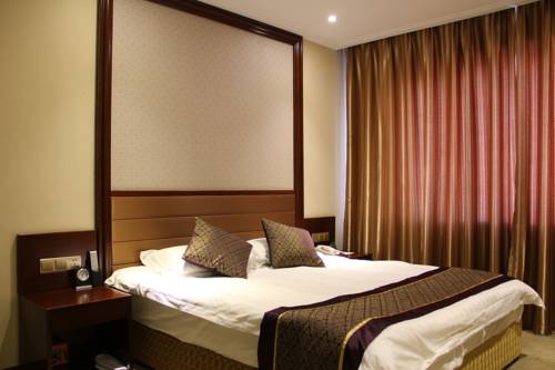 Imagen de la habitación del Hotel Hit Business Harbin. Foto 5