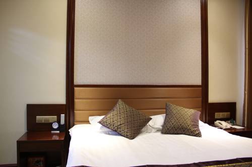 Imagen de la habitación del Hotel Hit Business Harbin. Foto 6