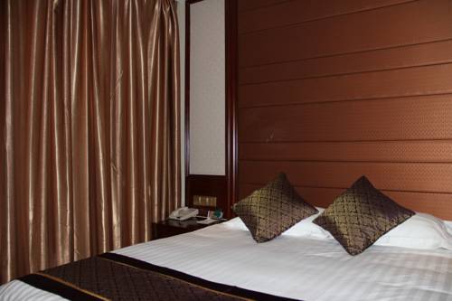 Imagen de la habitación del Hotel Hit Business Harbin. Foto 8