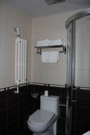 Imagen de la habitación del Hotel Hit Business Harbin. Foto 9