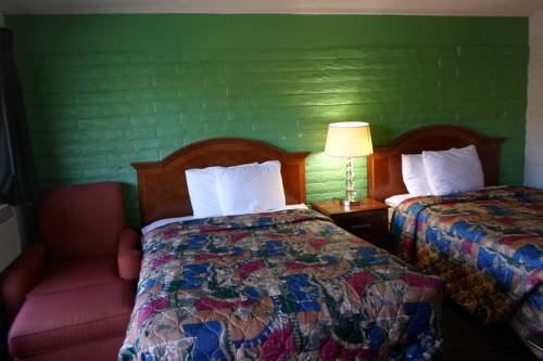 Imagen de la habitación del Hotel Hitching Post Studios Inn. Foto 11