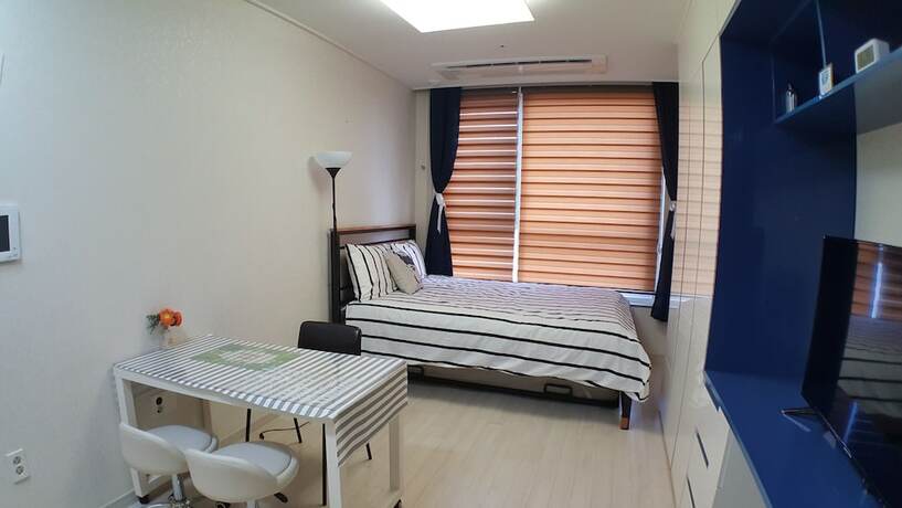 Imagen de la habitación del Hotel Hitomorrow Residence. Foto 11