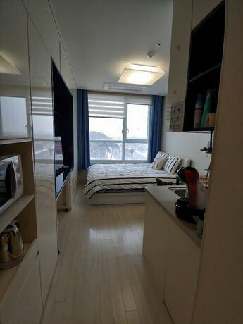 Imagen de la habitación del Hotel Hitomorrow Residence. Foto 13