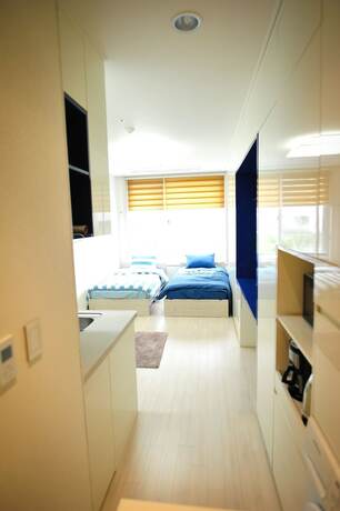 Imagen de la habitación del Hotel Hitomorrow Residence. Foto 17