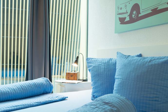 Imagen de la habitación del Hotel Hitrental Allmend Comfort Apartments. Foto 2