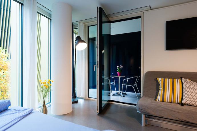 Imagen de la habitación del Hotel Hitrental Allmend Comfort Apartments. Foto 10