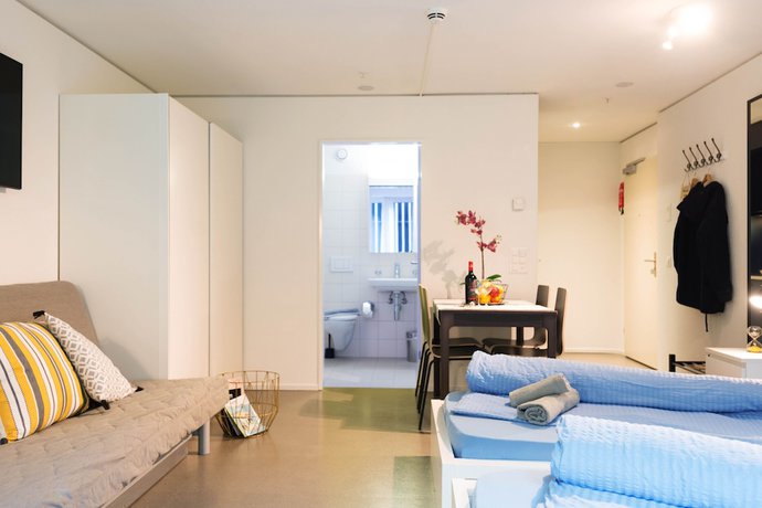 Imagen de la habitación del Hotel Hitrental Allmend Comfort Apartments. Foto 17