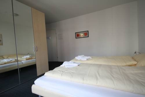 Imagen de la habitación del Hotel Hitrental Zugersee Apartments. Foto 15