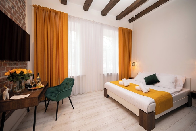 Imagen de la habitación del Hotel Hive Family House. Foto 6