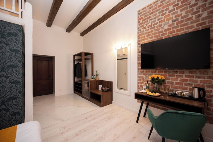 Imagen de la habitación del Hotel Hive Family House. Foto 9