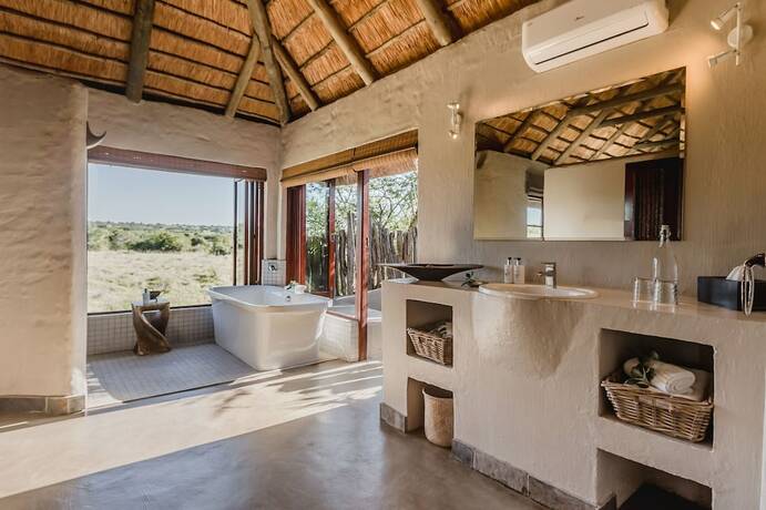 Imagen de la habitación del Hotel Hlosi Game Lodge - Amakhala Game Reserve. Foto 18
