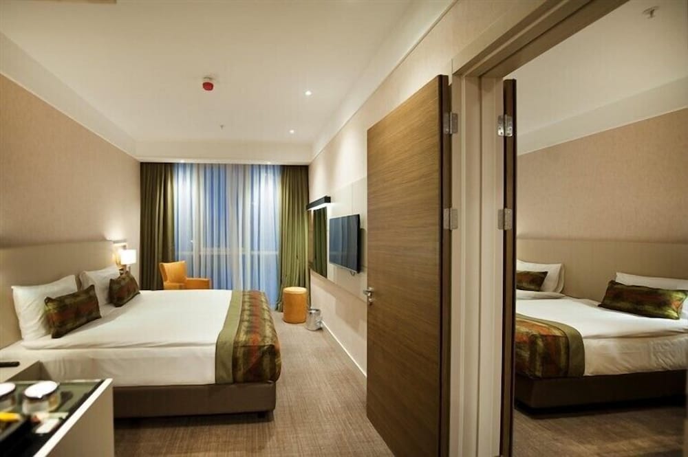 Imagen de la habitación del Hotel Hm Commerce Hotel. Foto 14