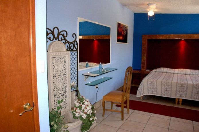 Imagen de la habitación del Hotel Hn. Foto 8