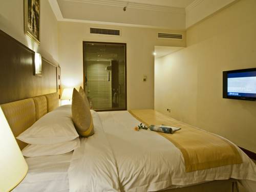 Imagen de la habitación del Hotel Hna Business Downtown Haikou. Foto 1