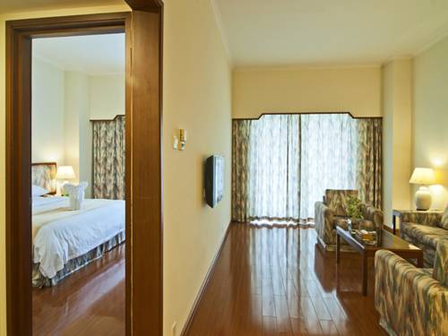 Imagen de la habitación del Hotel Hna Business Downtown Haikou. Foto 5